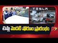 tesla opens first india showroom in mumbai ntv telugu