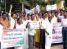 agitation, contract employees, health assistants stage protest raise slogans against govt, Contract employees