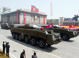 N Korea loads two missiles on launchers