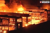 KPN Travels bus, burnt, 56 kpn travels buses worth rs 50 crore burnt in bengaluru, Agitation