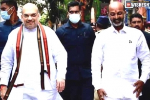 Bandi Sanjay Trolled For Carrying The Shoes Of Amit Shah