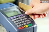 Demonetization, PoS machine, govt to remove service tax on all debit credit card transactions, Us machine