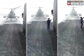 convoy driver, direction, kazakhstan helicopter lands on the road pilot gets down to ask direction, Helicopter