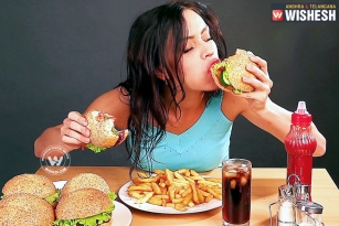 Reason why some women can&rsquo;t stop eating junk food