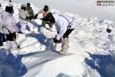 Siachen Avalanche rescue team, Siachen Avalanche rescue team, siachen avalanche four soldiers and two civilians killed, Soldier