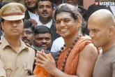 Swami Nithyananda news, Swami Nithyananda controversies, swami nithyananda fled from the country says cops, Nithyananda