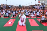 Baba Ramdev, Amit Shah, pm modi kick starts third international yoga day in up, Baba ramdev
