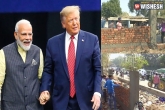 Donald Trump news, Narendra Modi, trump roadshow govt building a wall to cover slums, Ahmedabad