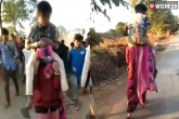 viral video of MP woman, MP woman boy on shoulders, mp woman forced to carry a boy on her shoulders for leaving her husband, Woman