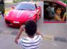 ferrari son nri father, nri son drives ferrari, nri booked for letting his minor son drive ferrari, Ferrari