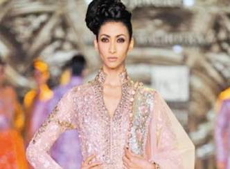 Models wear lehengas as heavy as 35kg