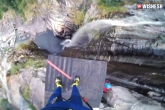 man jumps from 59m mountain, man jumps from cliff, man jumps from 59m cliff sets world record, Mountain
