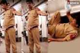 viral videos, drink police train, viral drunken police behavior in public train, Drunken