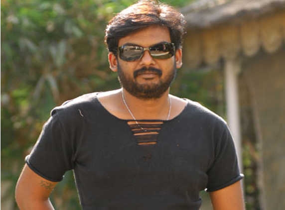 Puri Jagannath. a sensational director in T-Town.