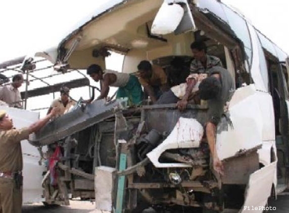 10 persons injured in bus-truck collision