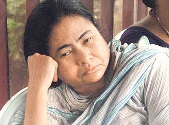 Mamta Banerjee walking on a tight rope